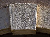 Mison-les-Armands  Sur la clé d'une porte voutée